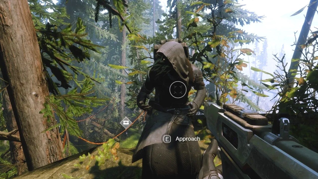 The mysterious tentacle-faced merchant Xur in Destiny. Here they are standing in a forest of pine trees.