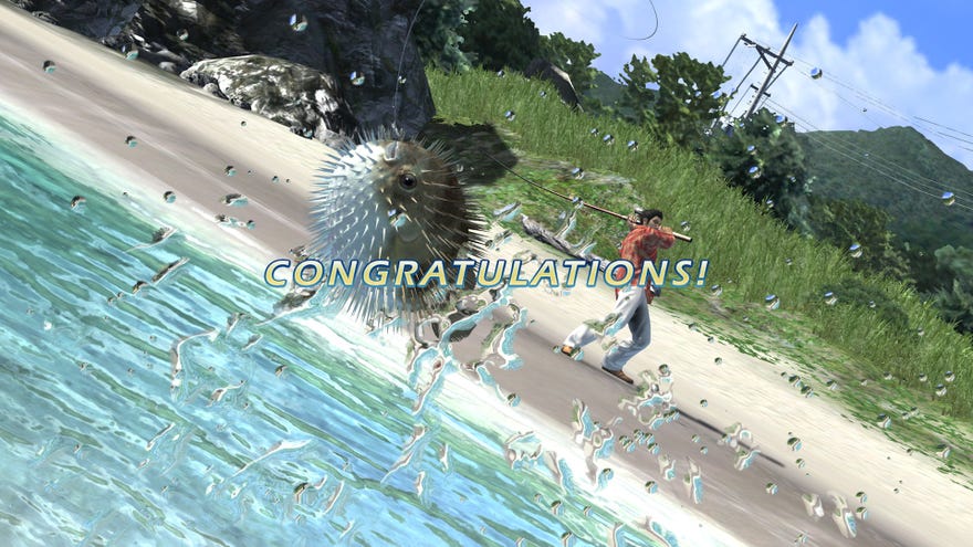 Kiryu hooks in a puffer fish off the shores of Okinawa, with “congratulations!” signalling his success, in Yakuza 3 Remastered.