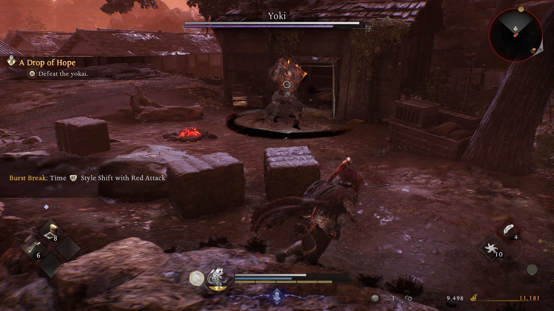 Running around the boss Yoki, who stands by a house doorway in Nioh 3. - 5