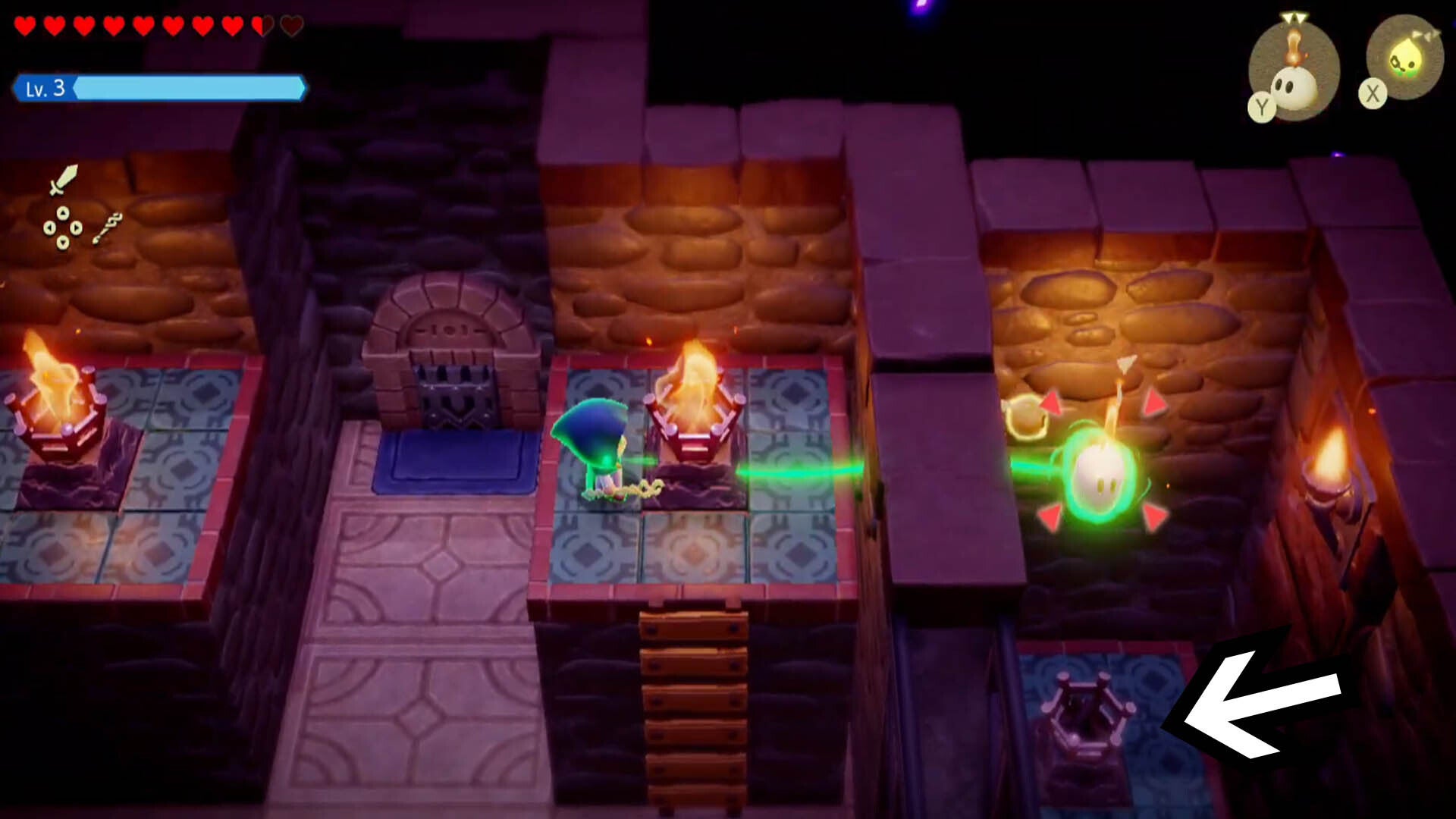 zelda echoes of wisdom hyrule castle dungeon using bind to light torch behind wall