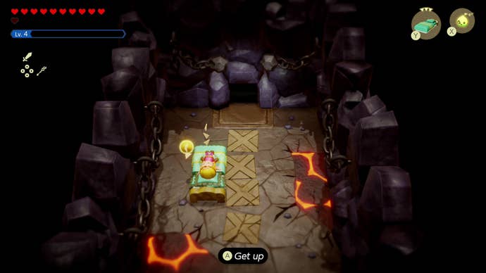 Zelda takes a quick nap on a fancy bed inside a lava cave in The Legend of Zelda: Echoes of Wisdom.