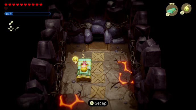 Zelda takes a quick nap on a fancy bed inside a lava cave in The Legend of Zelda: Echoes of Wisdom.
