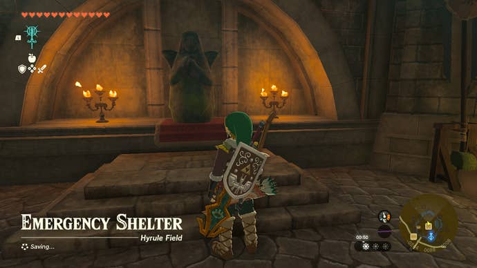 Link standing next to the goddess statue that upgrades hearts and stamina in Zelda: Tears of the Kingdom