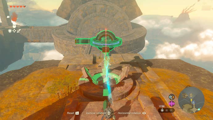 Link using the Ultrahand power to grab a treasure chest in Zelda: Tears of the Kingdom