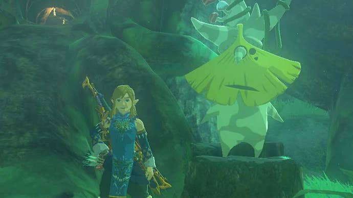 Link standing by a Korok in Zelda Tears of the Kingdom.