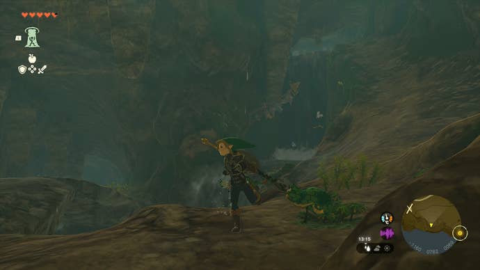 Link searching behind a waterfall for Misko's Treasure in Zelda: Tears of the Kingdom