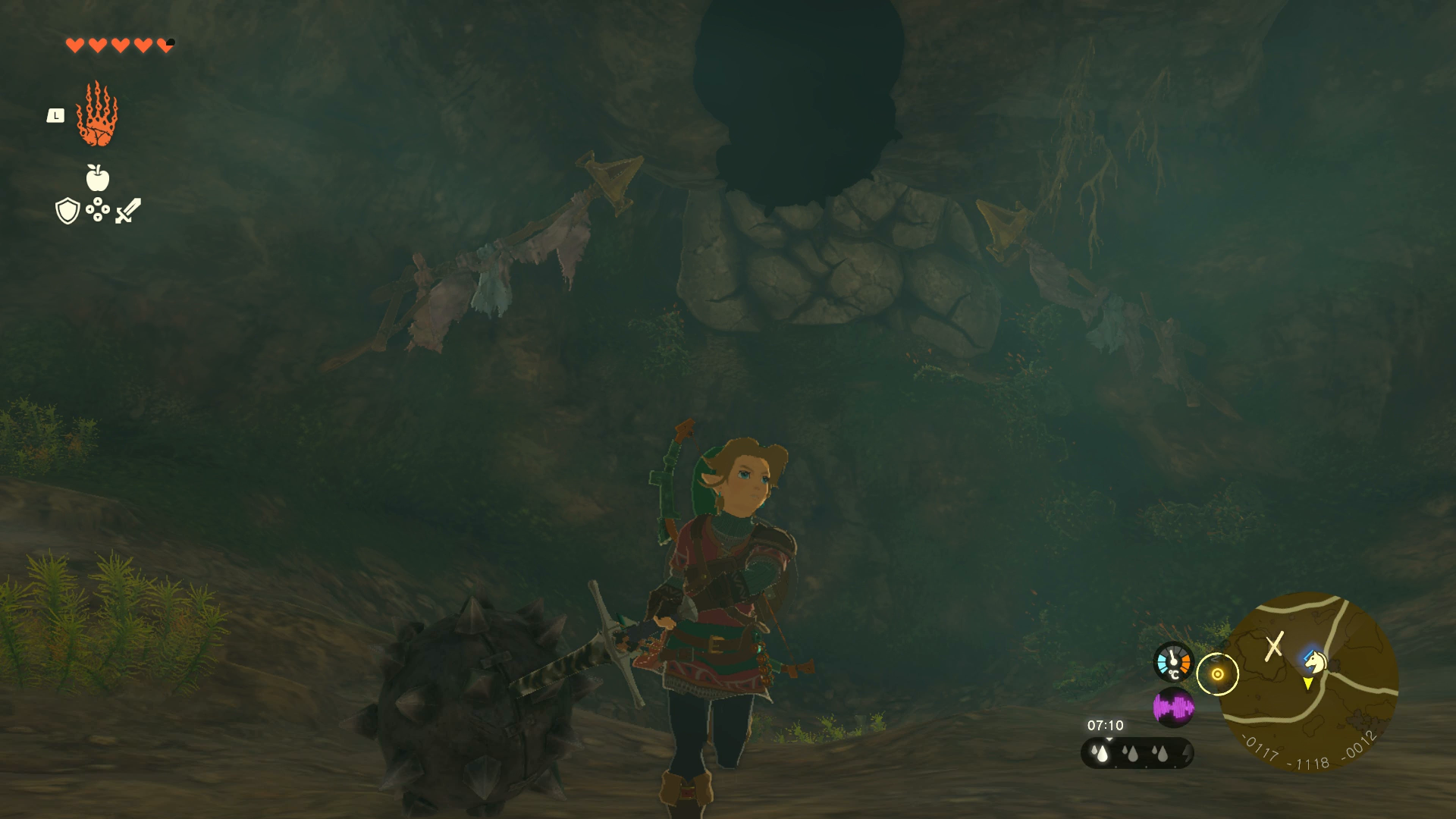 Link destroying some cracked rocks in Zelda: Tears of the Kingdom
