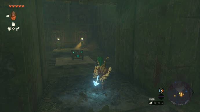 Link using Ultrahand to place a treasure chest on a button in Zelda: Tears of the Kingdom