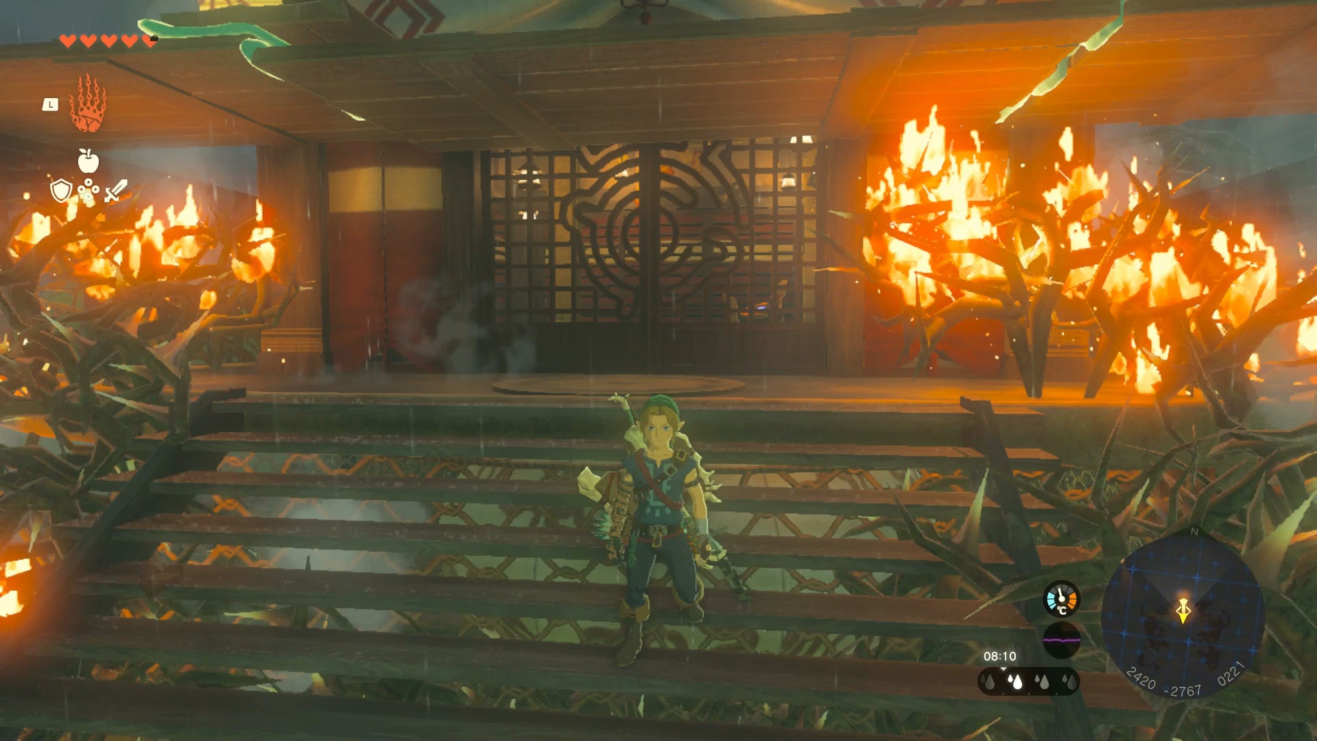 Link setting some bushes on fire to reach Rabella Wetlands Skyview Tower in Zelda: Tears of the Kingdom - 1