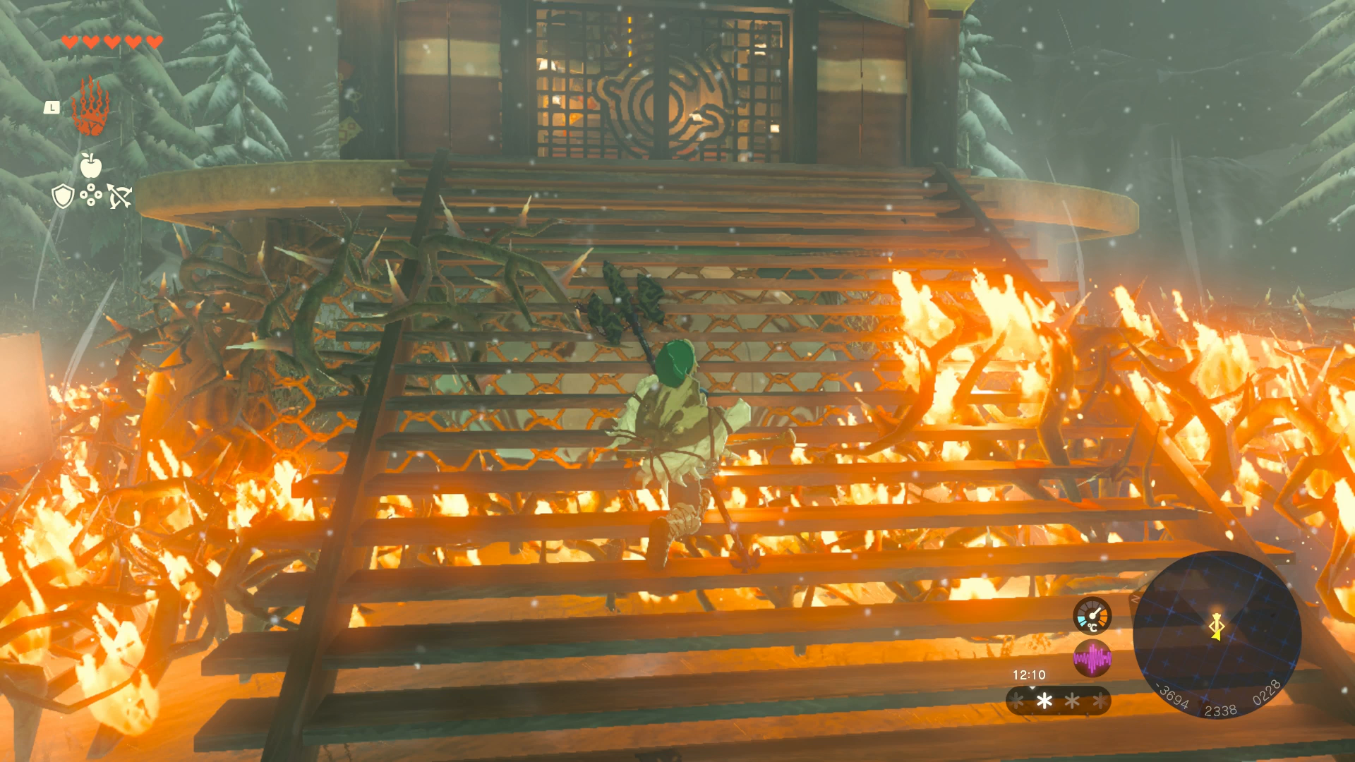 Link burning away the bushes blocking Rospro Pass Skyview Tower in Zelda: Tears of the Kingdom