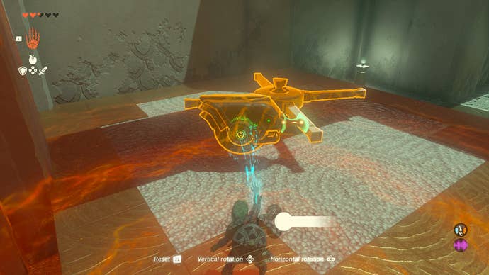 Link using the Ultrahand power to attach a wheel to a crank inside Susuyai Shrine in Zelda: Tears of the Kingdom