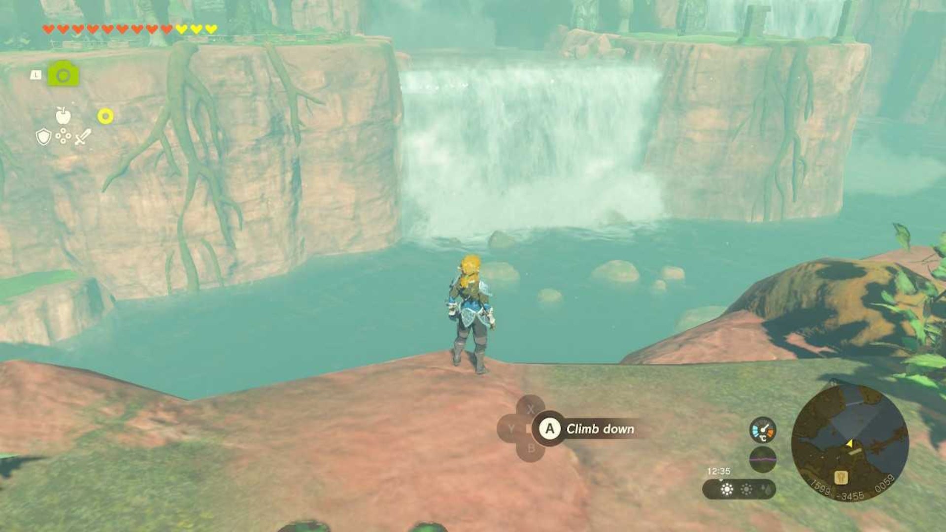 zelda totk link looking at waterfall in sanctuary near lakeside stable