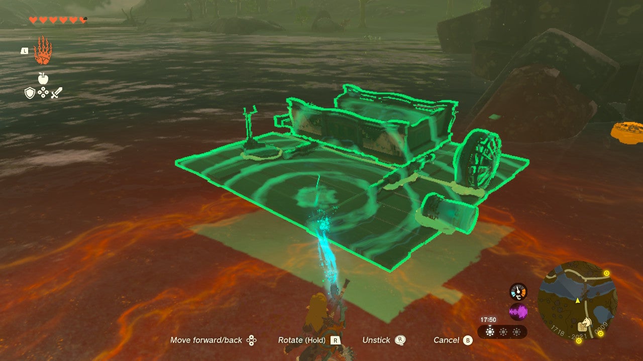 Link trying to create a makeshift raft in The Legend of Zelda: Tears of the Kingdom.