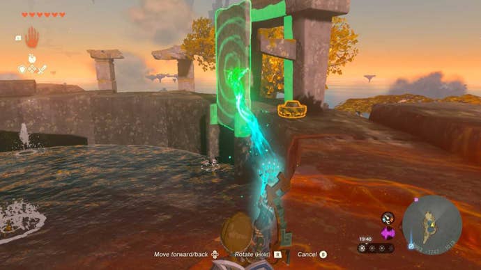 zelda totk south hyrule sky archipelago link using ultrahand to lift gate to drain pond