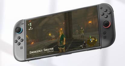 Zelda Tears of the Kingdom being played on a Switch 2 in handheld mode, sort of floating on a greyed out background.