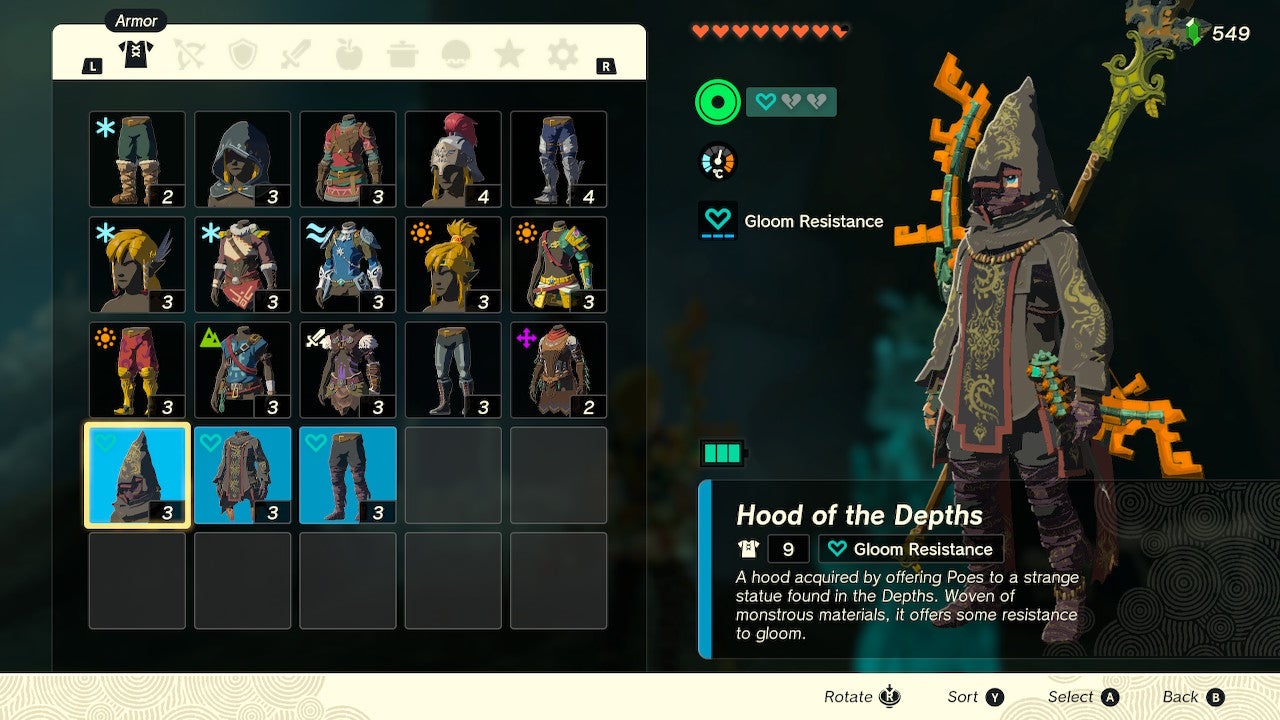 An armor menu screen in Tears of the Kingdom showing all three pieces of Gloom-resistant armor in a player&rsquo;s inventory.
