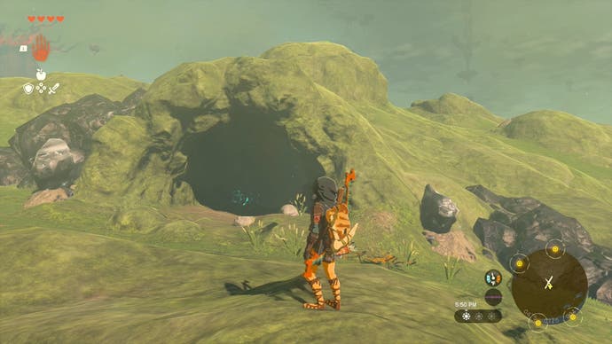 Link standing by the Crenel Hills Cave, which is where players can find the Barbarian Armor.