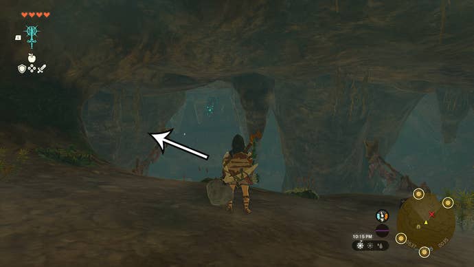 Link in the Crenel Hills Cave, with an arrow pointing in the direction players need to head to find the Barbarian Armor.