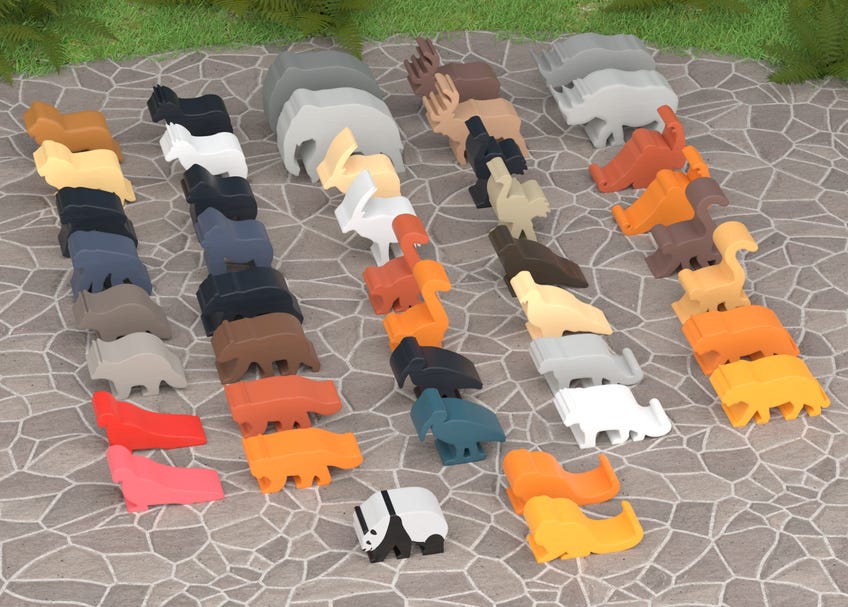 Production image of Zoo Tycoon: The Board Game's animal meeples.